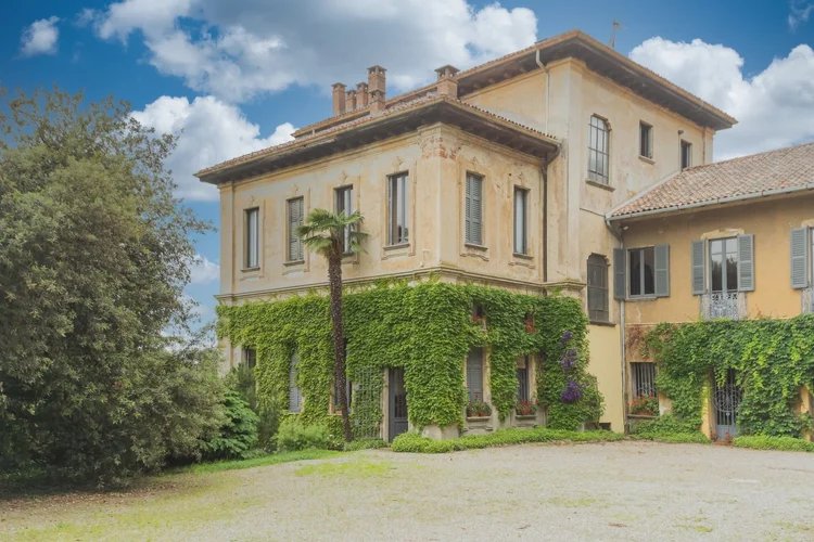 The main house with ivy on the lower floor